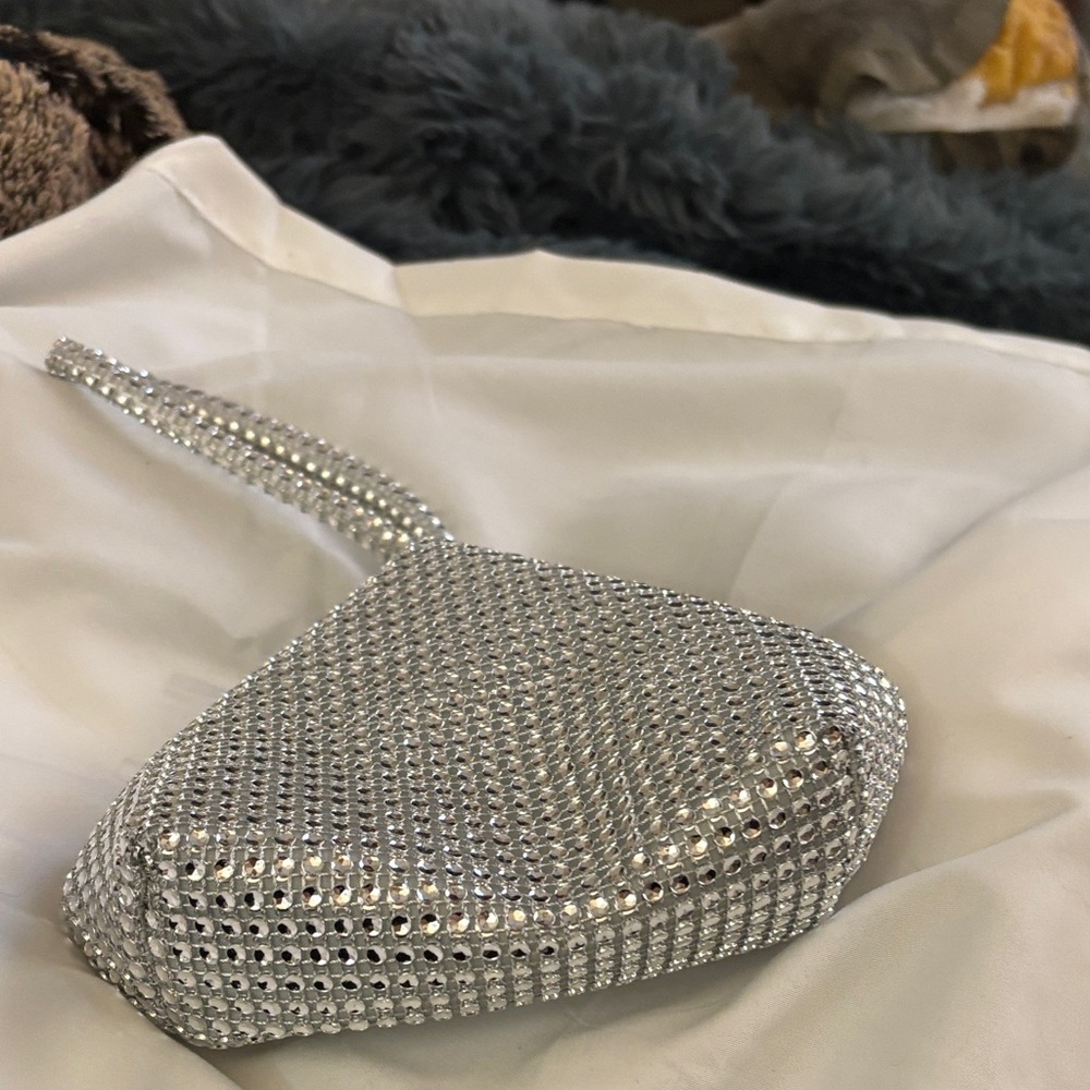 Elegant Silver Rhinestone Wristlet with magnetic clasp.